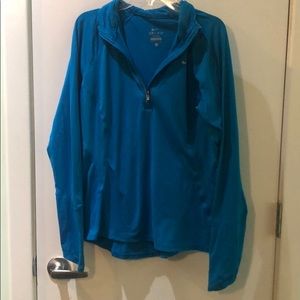 Long sleeve turquoise Nike zip up.